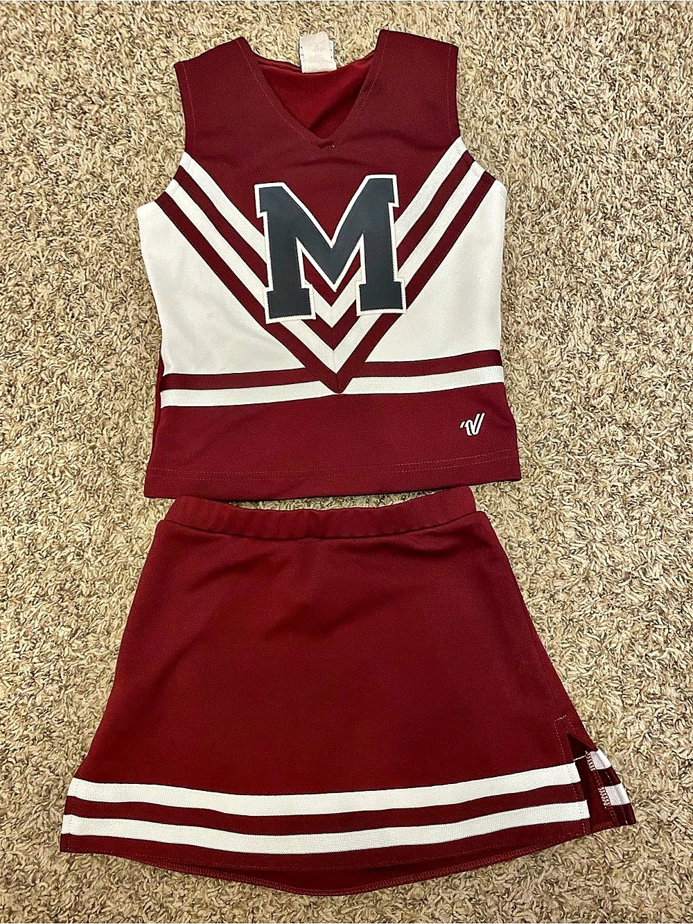 Varsity maroon and white cheer uniform